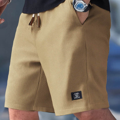 Herreshorts med justerbar talje og funktionelle lommer