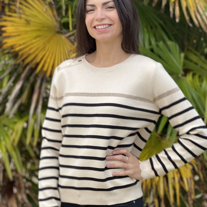 Women's striped knit sweater with a crew neck and shoulder buttons