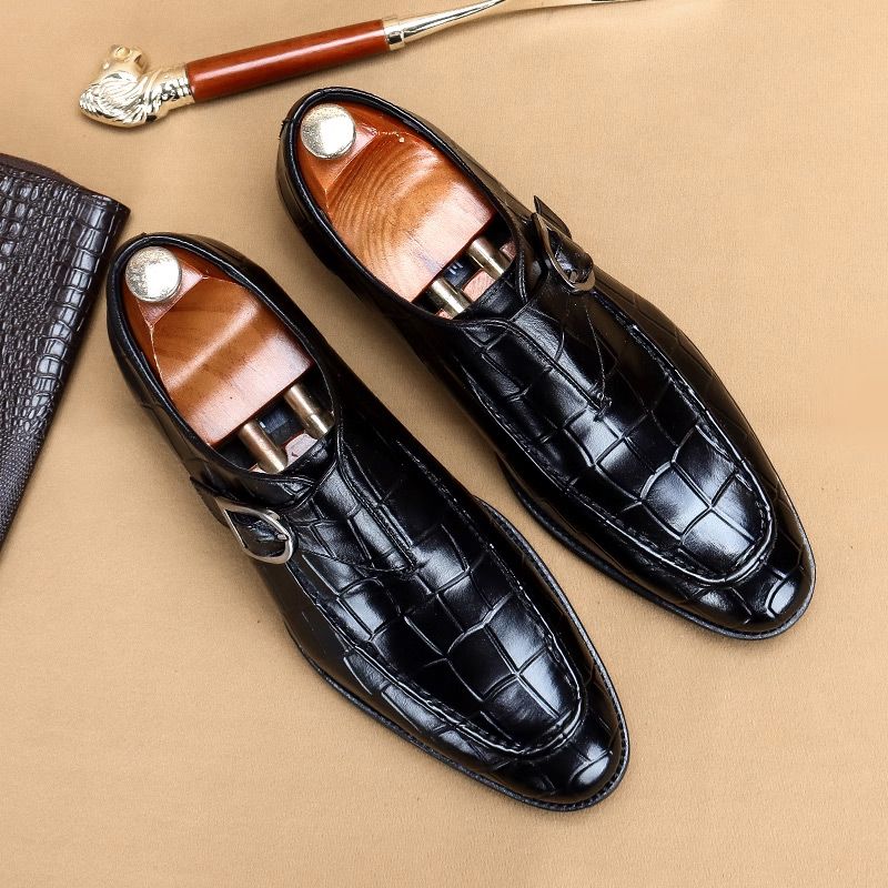 Men's elegant square-toe shoes with an adjustable strap and rubber sole.
