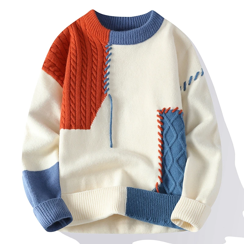Maglione patchwork invernale, colori crema, rosso e blu, design a blocchi, maniche lunghe, tessuto a maglia, moda casual, stile moderno.