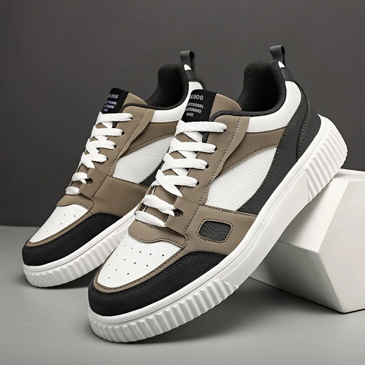 Men's leather and mesh sneakers with contrast inserts and a textured sole.