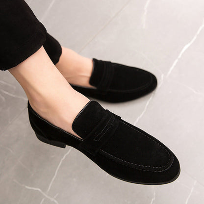 Men’s suede loafers with a minimalist design and padded insole.