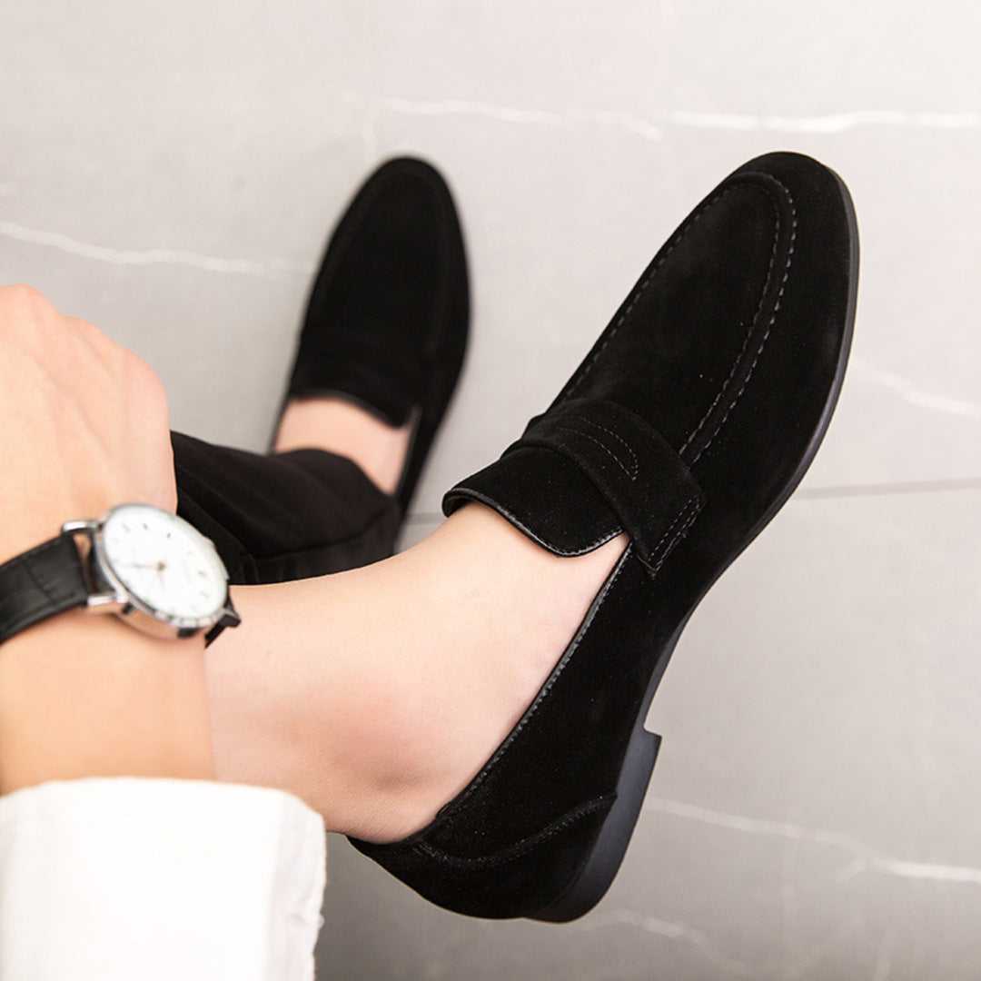 Men’s suede loafers with a minimalist design and padded insole.