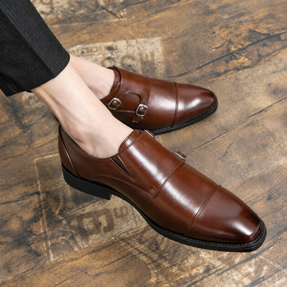 Men's Elegant Brown Faux-Leather Shoes with Metal Buckle and Brogue Details.
