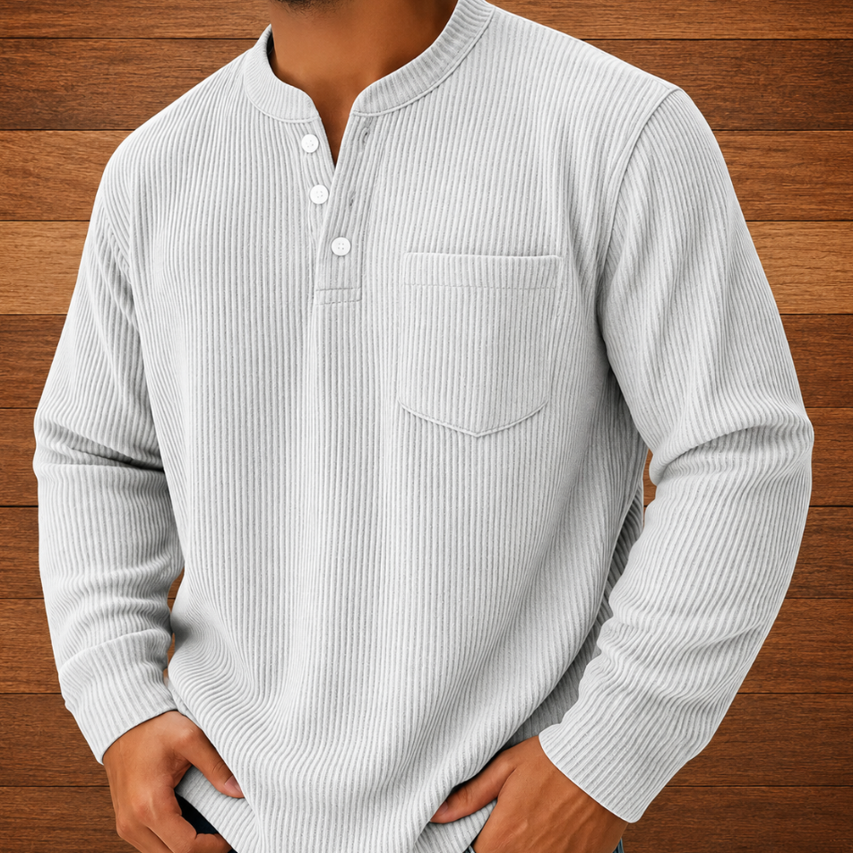 Camisa henley de hombre acanalada con cuello abotonado, bolsillo en el pecho y mangas largas.