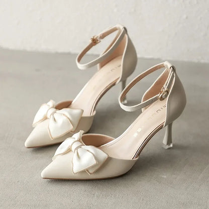 Women's Pointed Toe Pumps with Bow and Ankle Strap – Mid Heel