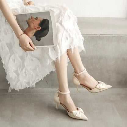 Women's Pointed Toe Pumps with Bow and Ankle Strap – Mid Heel