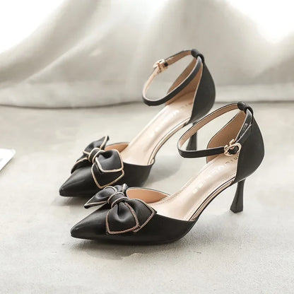 Women's Pointed Toe Pumps with Bow and Ankle Strap – Mid Heel