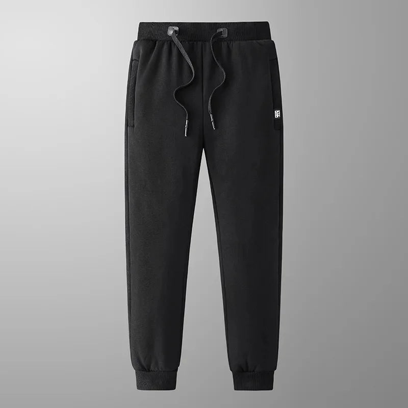 Vinterjoggingbukser til mænd foret med fleece, smal benform, elastisk talje – Casual stil