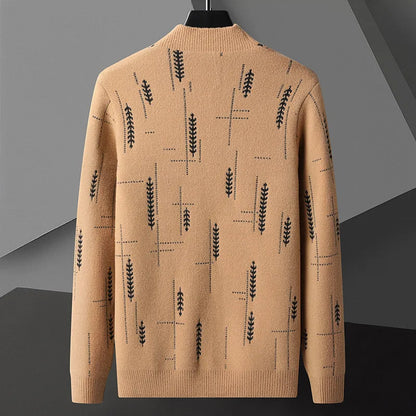 Maglione beige con motivo geometrico nero, design moderno, tessuto caldo e morbido, ideale per moda autunnale e invernale, abbigliamento casual elegante.