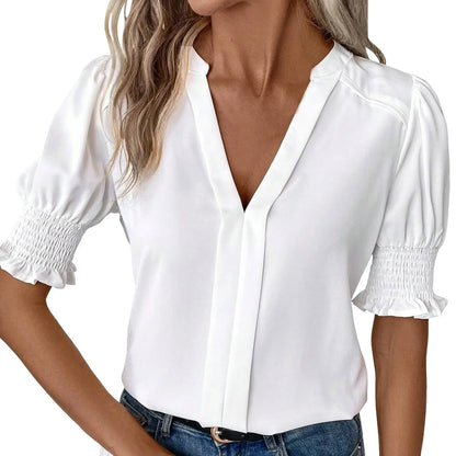 Damebluse med V-hals og puffede ærmer – chiffonstil