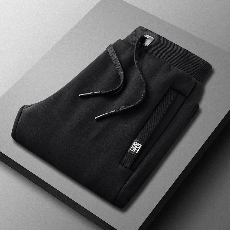 Vinterjoggingbukser til mænd foret med fleece, smal benform, elastisk talje – Casual stil