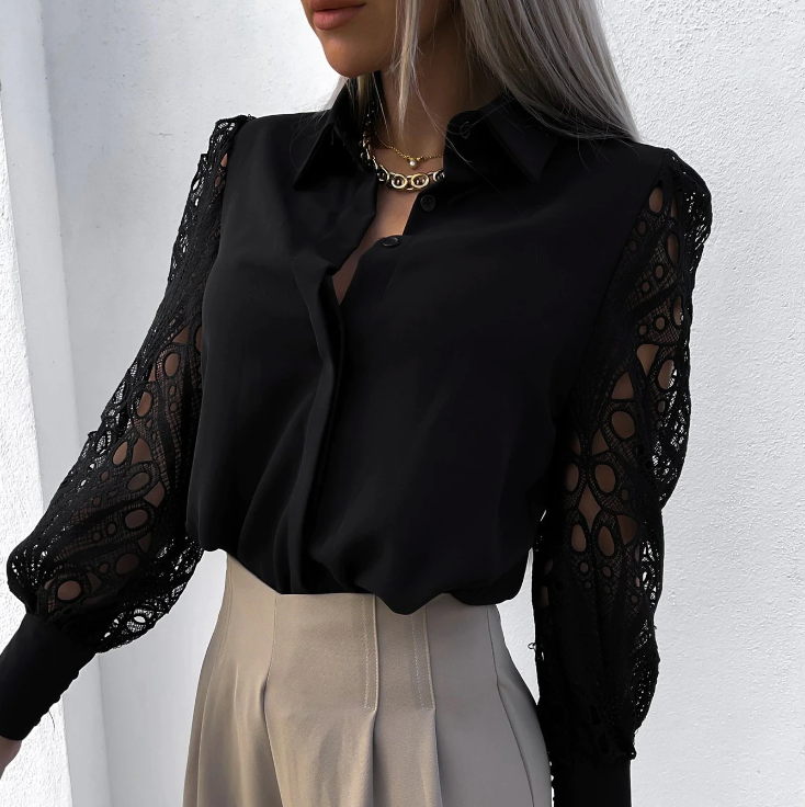 Damebluse med struktureret krave, rummelig pasform og knapper