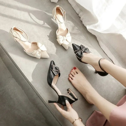 Women's Pointed Toe Pumps with Bow and Ankle Strap – Mid Heel