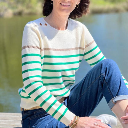 Women's striped knit sweater with a crew neck and shoulder buttons