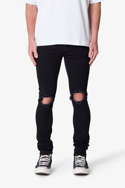 Jeans Uomo Skinny Neri con Effetto Sfumato e Vestibilità Allungata