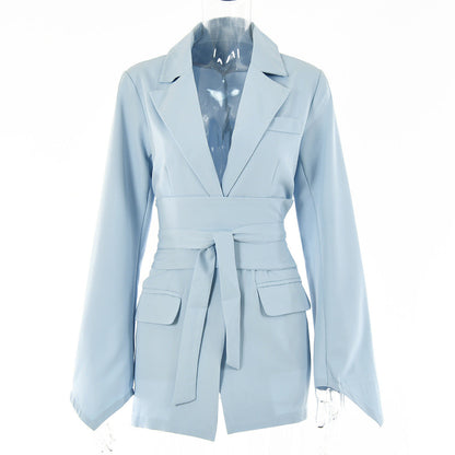 Women's autumn blazer with a belt and long bell sleeves.