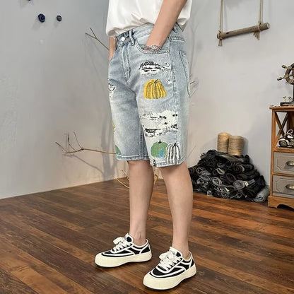 Pantaloncini Uomo Cropped con Effetto Strappato e Lavaggio Chiaro – Stile Denim