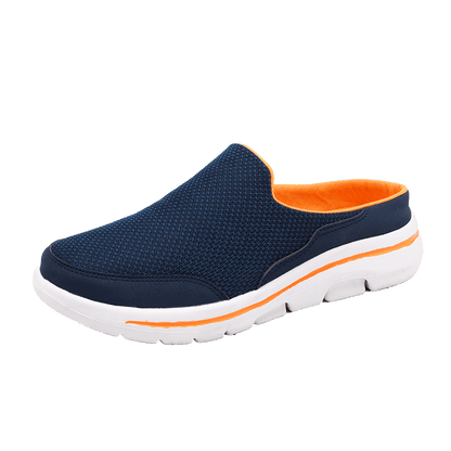 Scarpa slip-on blu navy con suola bianca, dettagli arancioni, design traspirante in mesh. Calzatura comoda e casual per uomo.