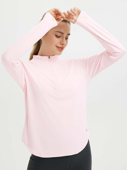 Damebluse med lange ærmer, afrundet kant, tommelhuller