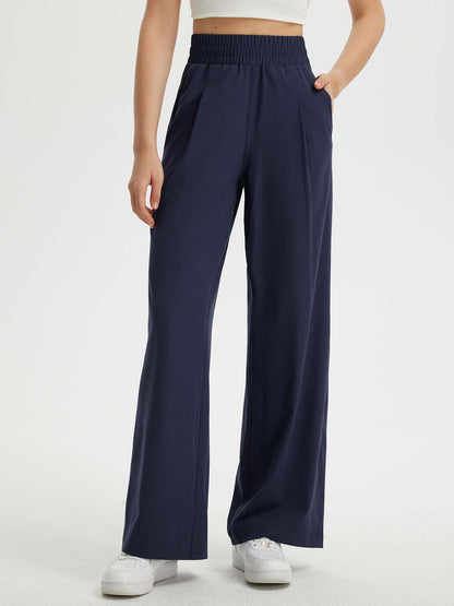 Pantaloni Donna Gamba Larga con Vita Elastica e Tasche