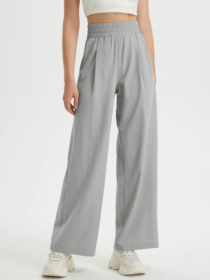 Pantaloni Donna Gamba Larga con Vita Elastica e Tasche