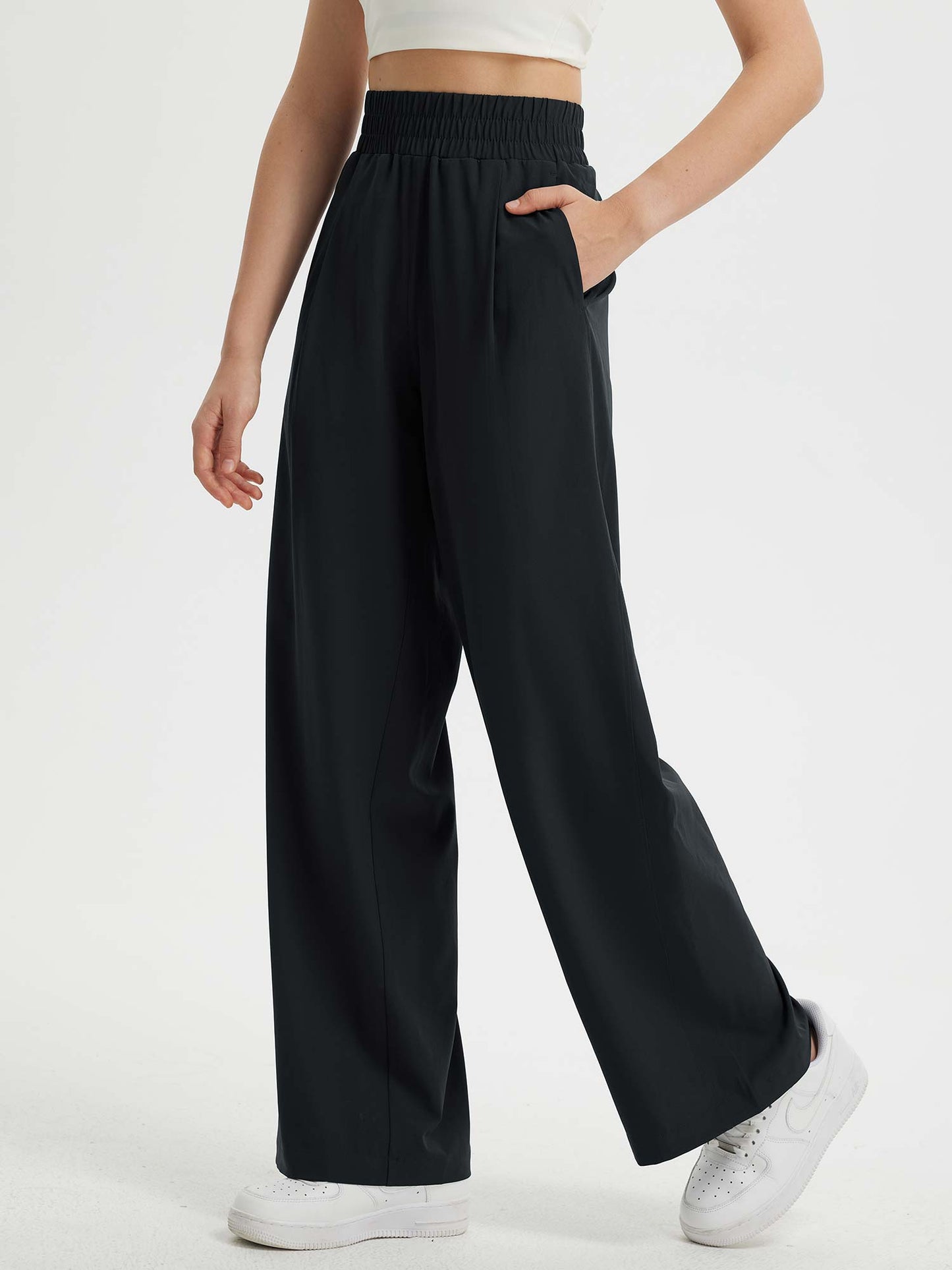 Pantaloni Donna Gamba Larga con Vita Elastica e Tasche