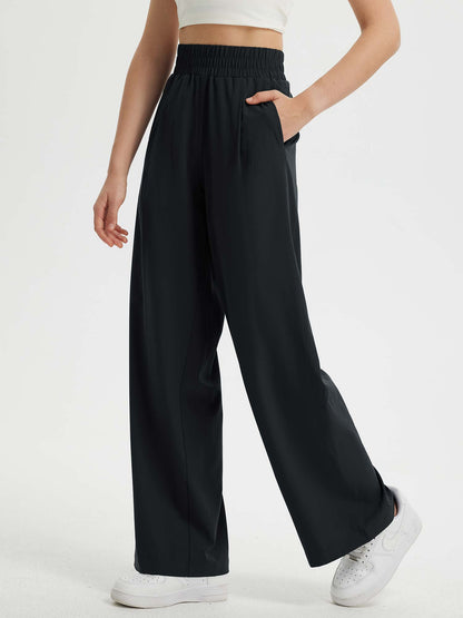Pantaloni Donna Gamba Larga con Vita Elastica e Tasche