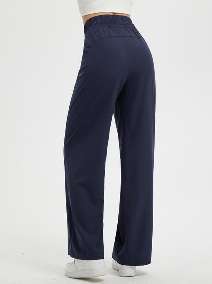 Pantaloni Donna Gamba Larga con Vita Elastica e Tasche