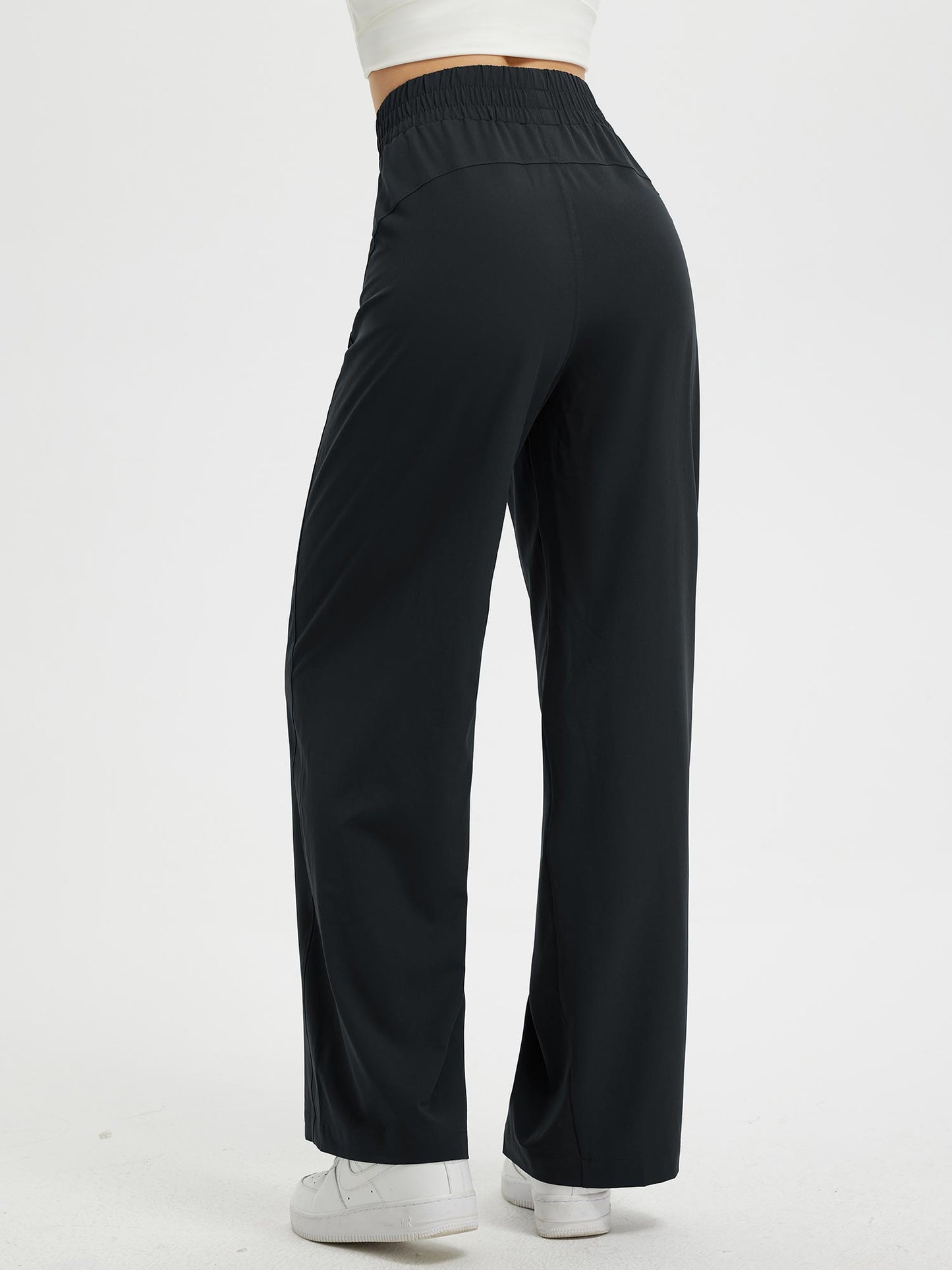 Pantaloni Donna Gamba Larga con Vita Elastica e Tasche