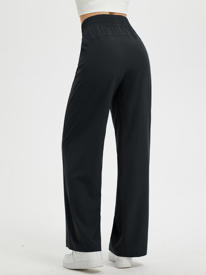 Pantaloni Donna Gamba Larga con Vita Elastica e Tasche
