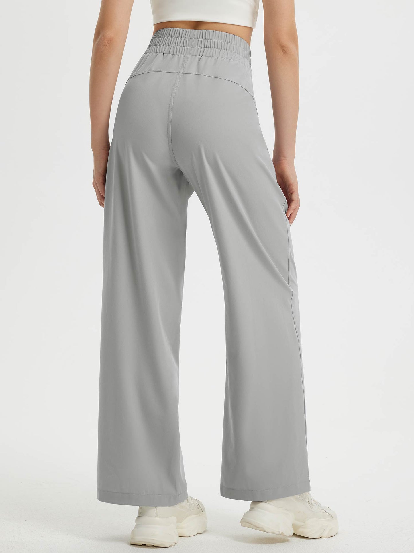 Pantaloni Donna Gamba Larga con Vita Elastica e Tasche