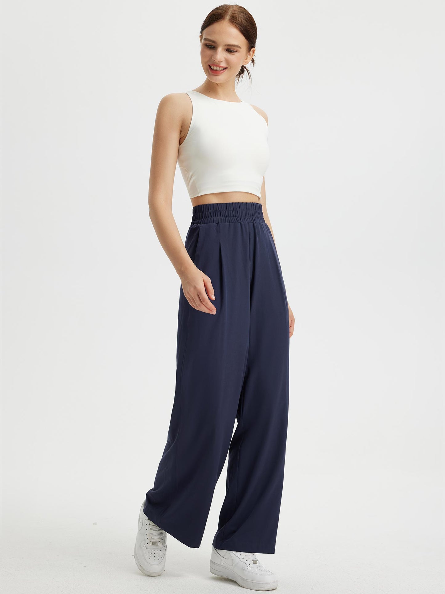Pantaloni Donna Gamba Larga con Vita Elastica e Tasche