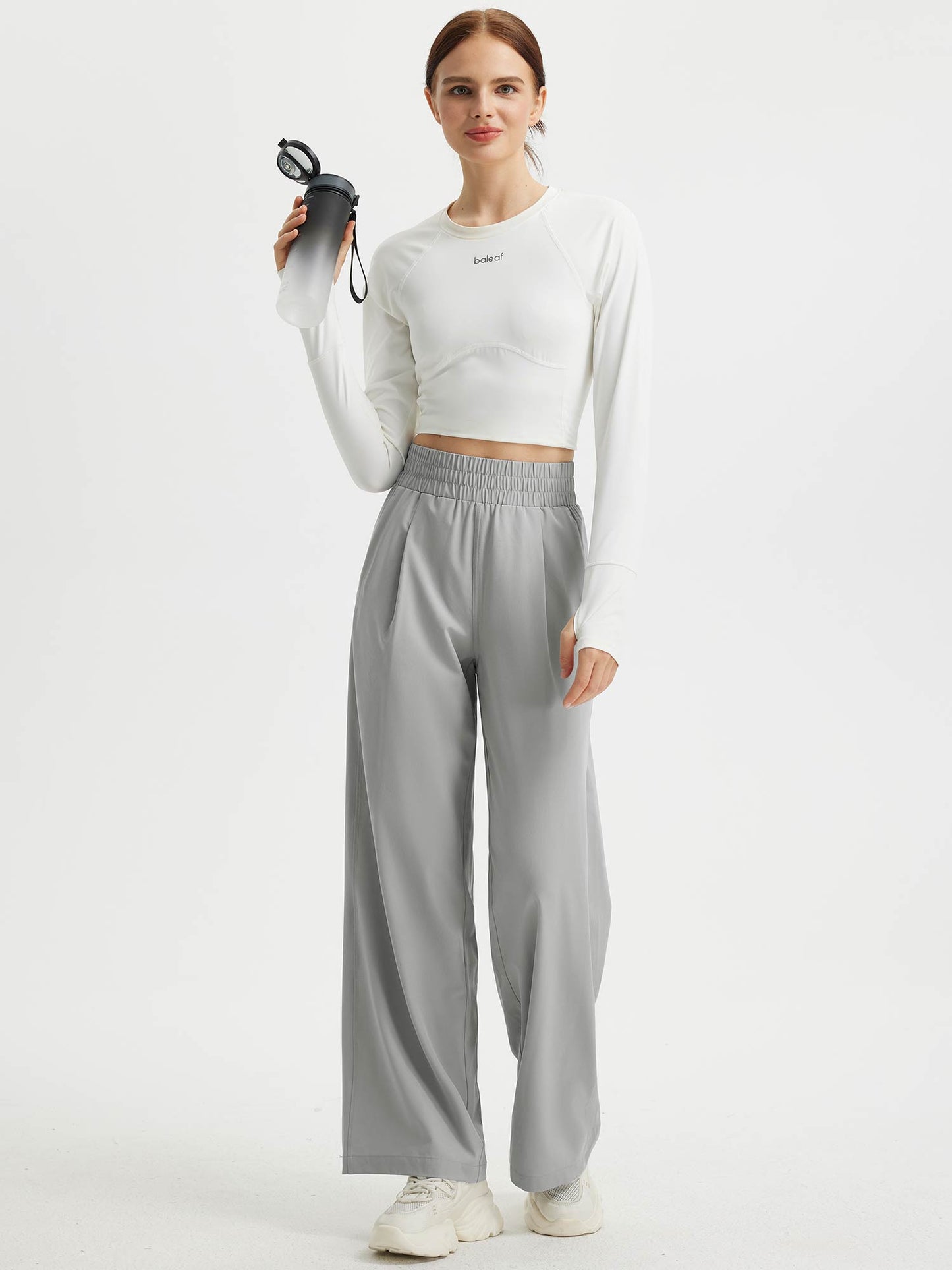 Pantaloni Donna Gamba Larga con Vita Elastica e Tasche