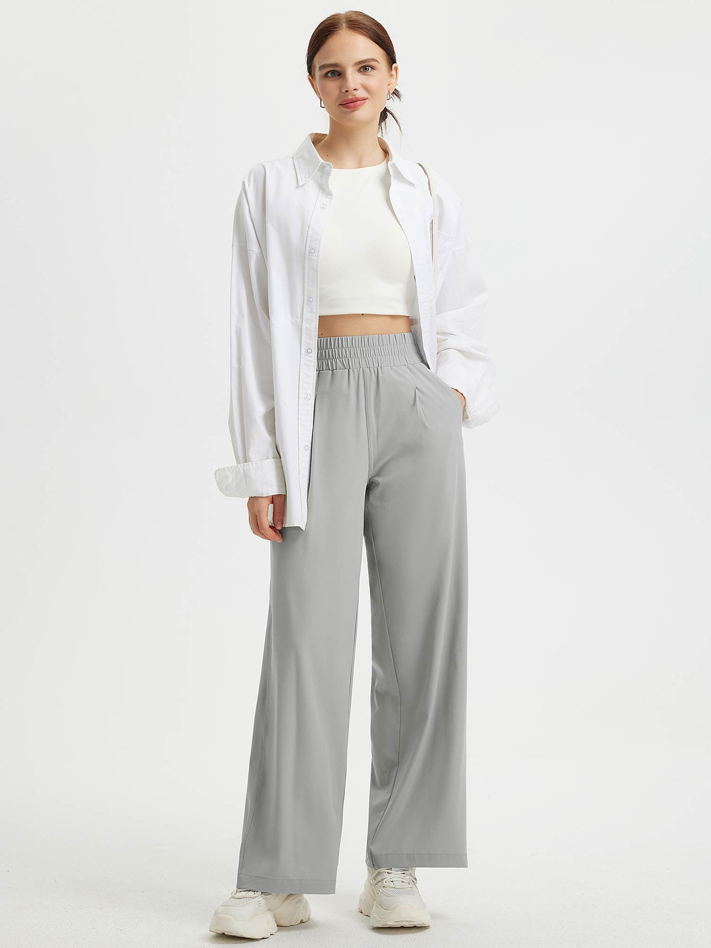 Pantaloni Donna Gamba Larga con Vita Elastica e Tasche