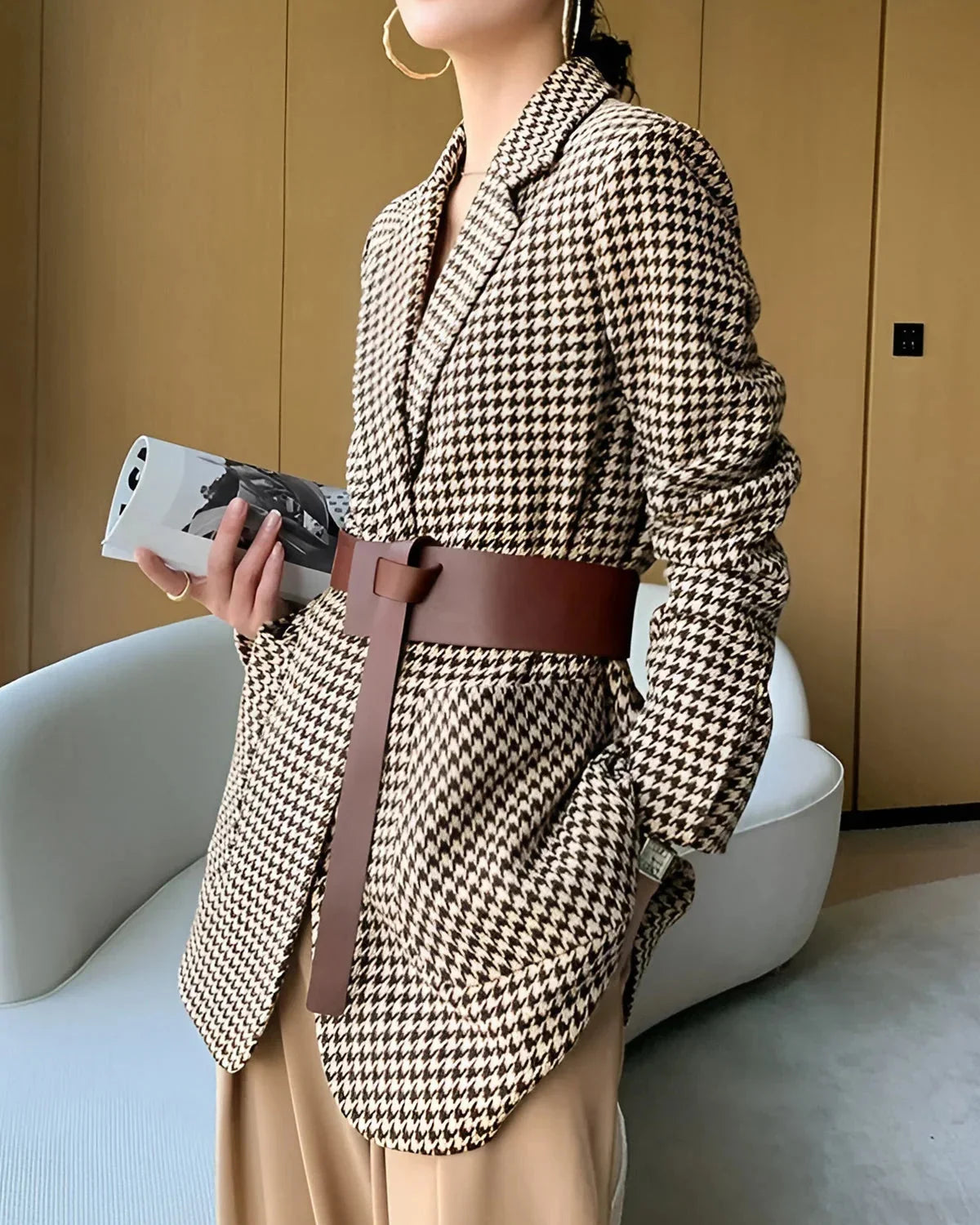 Women's fall blazer with a houndstooth print, adjustable belt, and slit