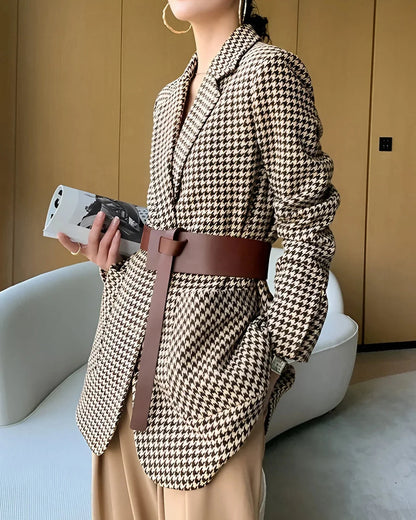 Women's fall blazer with a houndstooth print, adjustable belt, and slit