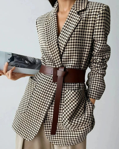 Women's fall blazer with a houndstooth print, adjustable belt, and slit
