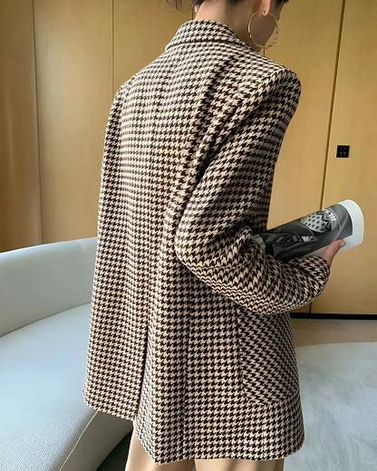Women's fall blazer with a houndstooth print, adjustable belt, and slit