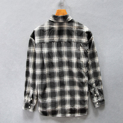 Camisa de hombre de otoño a cuadros de algodón, corte holgado y manga larga.