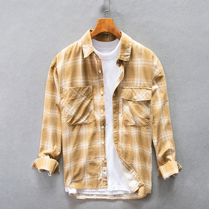 Camisa de hombre de otoño a cuadros de algodón, corte holgado y manga larga.