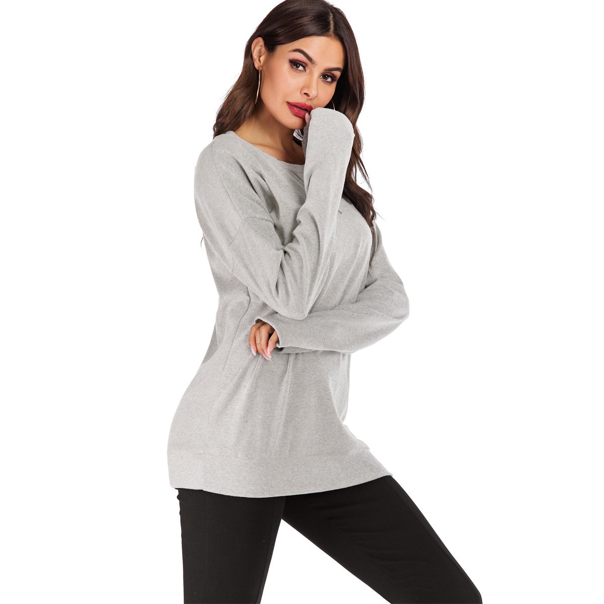 Jersey de mujer de manga larga con cuello redondo, ajuste holgado y color liso