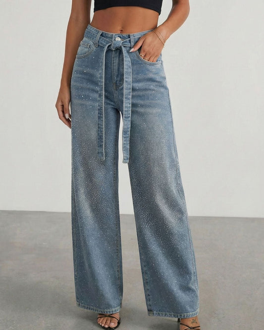 Damejeans i denim med højtalje og brede ben i løs pasform.
