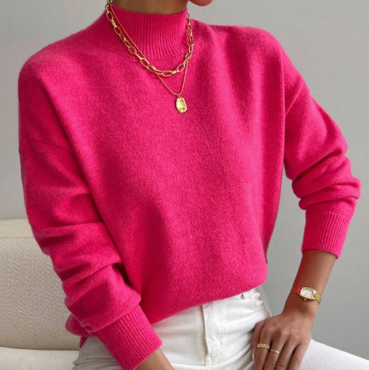 Women's cashmere turtleneck sweater with a straight fit and ribbed trims.