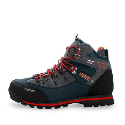 Scarponcino da trekking grigio e nero con lacci rossi, suola antiscivolo e dettagli arancioni. Ideale per escursioni in montagna e attività outdoor.
