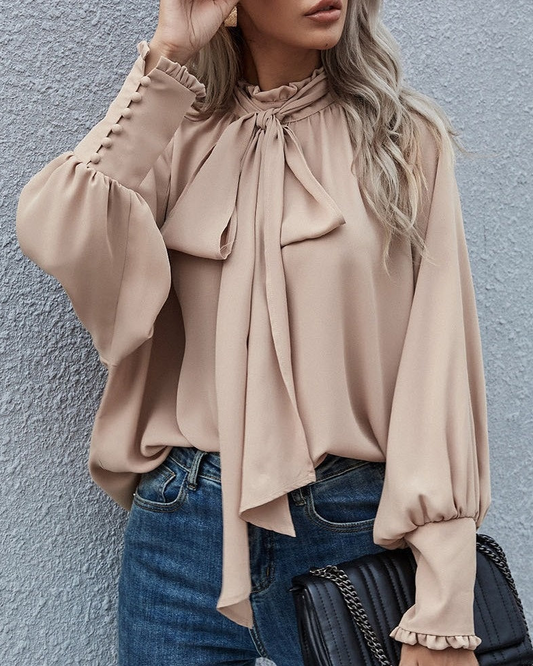 Blusa de mujer de manga larga con lazo y mangas abullonadas