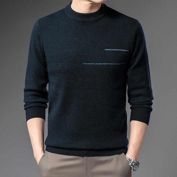 Maglione uomo nero elegante, design minimalista, indossato con pantaloni beige. Moda maschile autunno inverno, stile casual chic.