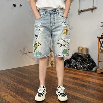 Pantaloncini Uomo Cropped con Effetto Strappato e Lavaggio Chiaro – Stile Denim