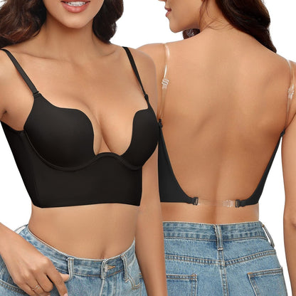 Reggiseno nero senza schienale con spalline trasparenti, design push-up, indossato da donna in jeans. Ideale per abiti scollati e look eleganti.