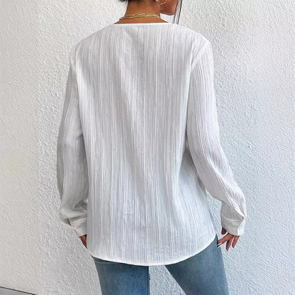 Camisa de mujer de manga larga y corte ajustado, con silueta entallada